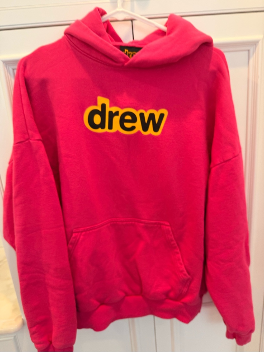 drew house hot pink hoodie with yellow logo